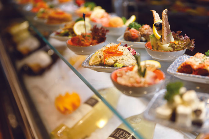 Costa Cruises' onboard food experience is heavily influenced by Mediterranean cuisine and European dining styles.