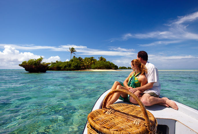 Couple on a boat in Fiji headed to a private island Fiji, Couple, Boat, private island, romantic, ocean, island, sea