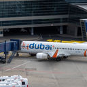 A flydubai Boeing 737 aircraft is pictured at an airport.