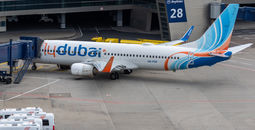 A flydubai Boeing 737 aircraft is pictured at an airport.