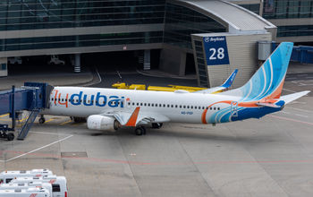 A flydubai Boeing 737 aircraft is pictured at an airport.