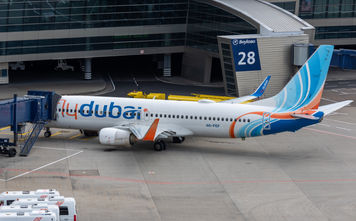 A flydubai Boeing 737 aircraft is pictured at an airport.