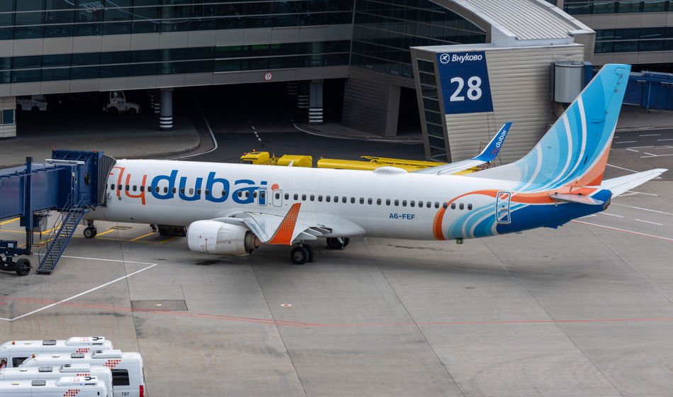 A flydubai Boeing 737 aircraft is pictured at an airport.
