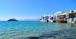 PONANT's Le Bougainville sailing the waters off the Greek island of Mykonos.