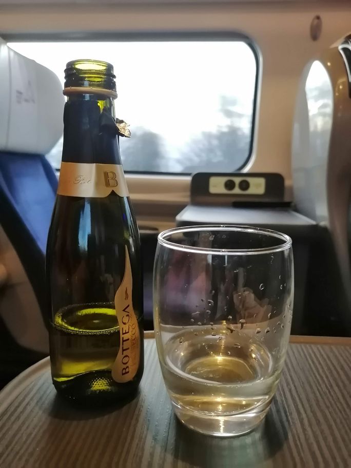 Sparkling wine on a British train Britain, rail travel, first class