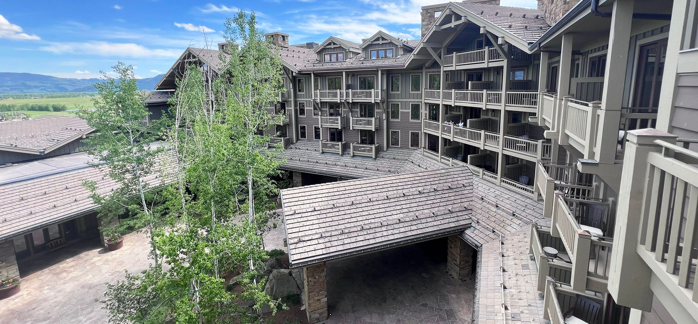 Image: View of the Four Seasons Resort and Residences Jackson Hole in Teton Village, Wyo. from a residential suite's balcony. (Photo Credit: Photo by Paul J. Heney.)