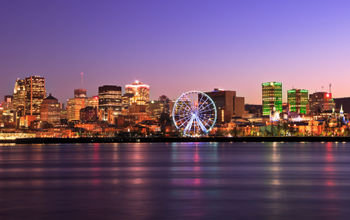 Montreal skyline at dusk and Saint Lawrence River in Quebec, Canada