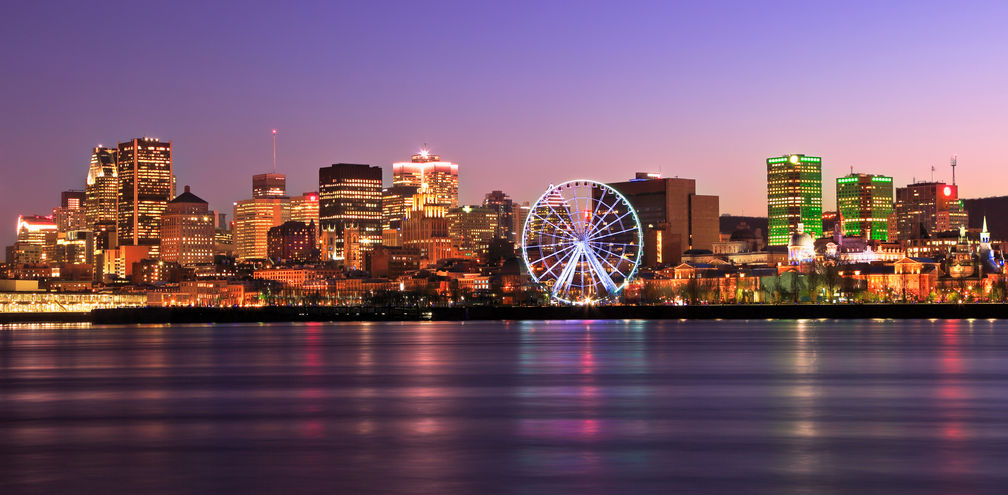 Montreal skyline at dusk and Saint Lawrence River in Quebec, Canada