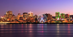 Montreal skyline at dusk and Saint Lawrence River in Quebec, Canada