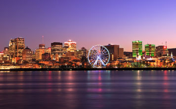 Montreal skyline at dusk and Saint Lawrence River in Quebec, Canada