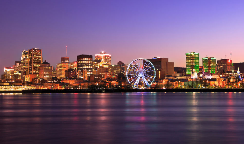 Montreal skyline at dusk and Saint Lawrence River in Quebec, Canada