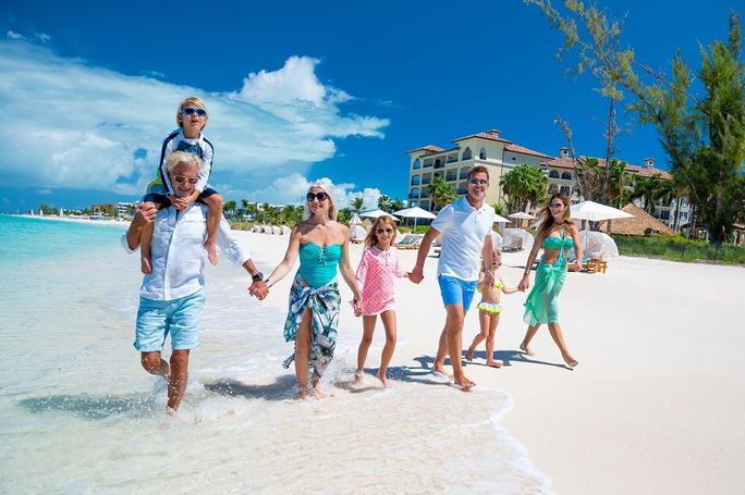 Family walking along the beach