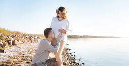 Couple celebrating on a babymoon