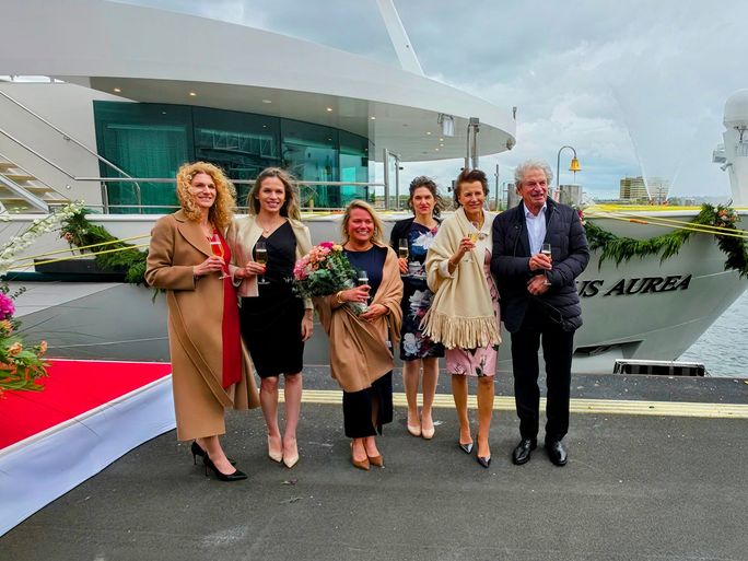 Amadeus Aurea's godmother, travel advisor Kristie Keller, poses with members of the Lueftner family following the ship's christening. Amadeus Aurea's godmother, travel advisor Kristie Keller, poses with members of the Lueftner family following the ship's christening.