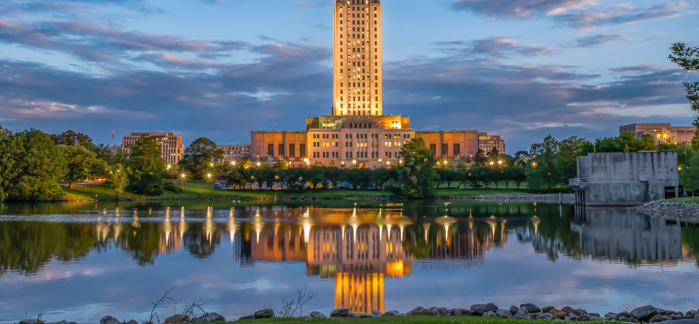 Image: Louisiana State Capitol building at dusk, Baton Rouge, Louisiana. (Photo Credit: Adobe Stock/Ball Studios)