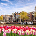 Historic buildings along a canal in Amsterdam, The Netherlands.