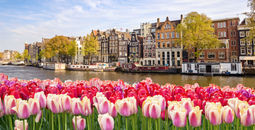 Historic buildings along a canal in Amsterdam, The Netherlands.
