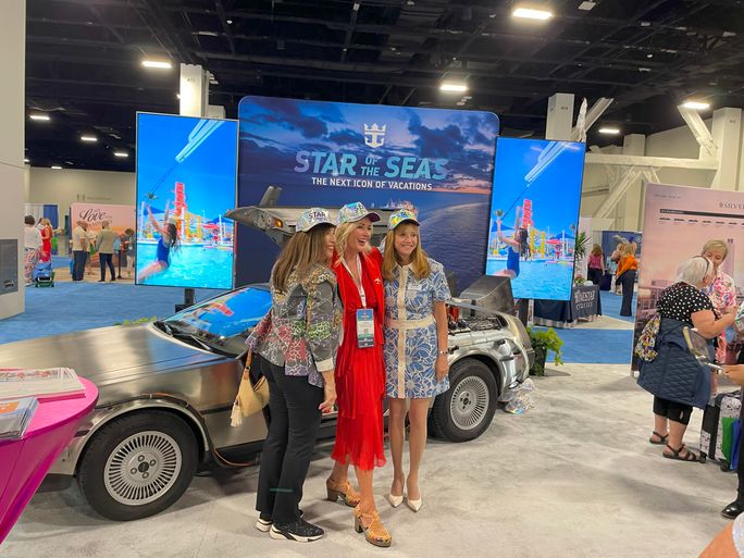 Royal Caribbean’s Vicki Freed (right) poses with travel advisors.