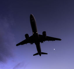 A plane flying at night, travel, redeye, flight,