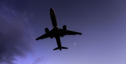 A plane flying at night, travel, redeye, flight,