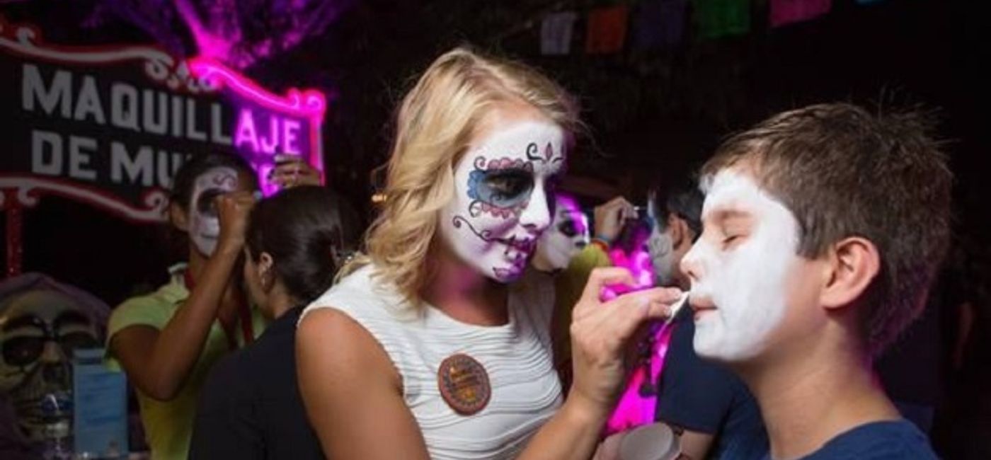 Image: PHOTO: Face Painting at Sandos During Day of the Dead. (photo courtesy of Sandos) (Photo Credit: Sandos Hotels & Resorts)