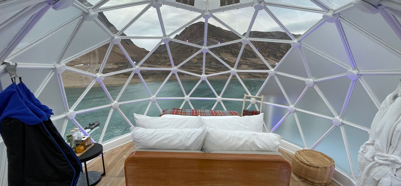 Image: Each igloo had a comfortable bed with a plush duvet for a glamping-style experience under the stars. (Photo Credit: Sarah Kuta)