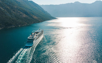Cruise ship sailing off in the distance