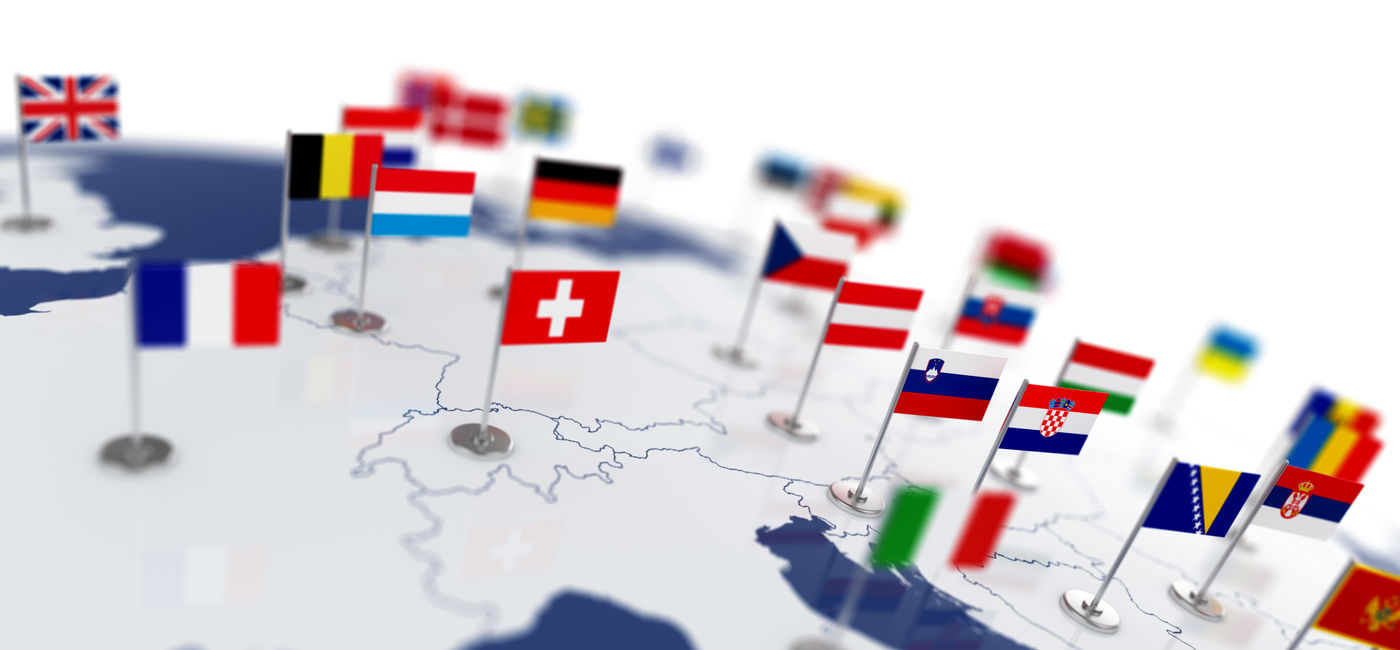 Image: Map of Europe with various countries' national flags. (Photo Credit: Adobe Stock/Denys Rudyi)