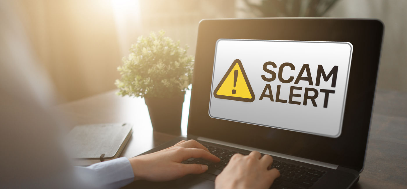 Image: Beware of travel scams. (Photo Credit: Adobe Stock/WrightStudio)