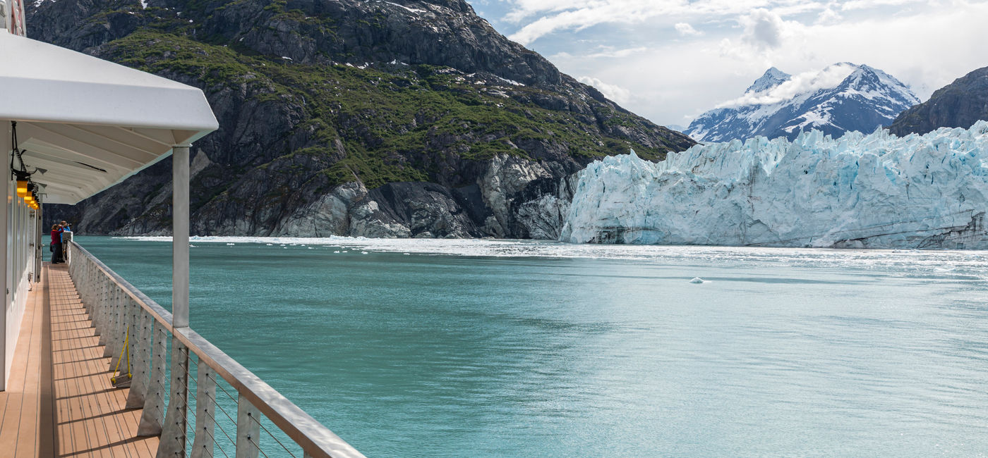 Image: Cruise ship near glacier in Glacier Bay, Alaska. (photo via Andrew Peacock / iStock / Getty Images Plus)