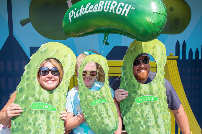 A family relishes their time at the Picklesburgh Festival in Pittsburgh. A family relishes their time at the Picklesburgh Festival in Pittsburgh.