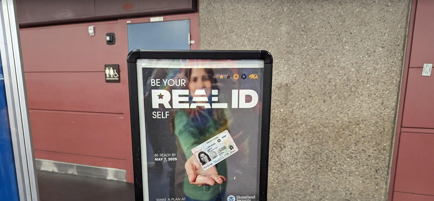 Image: REAL ID sign (Photo Credit: Eric Bowman)