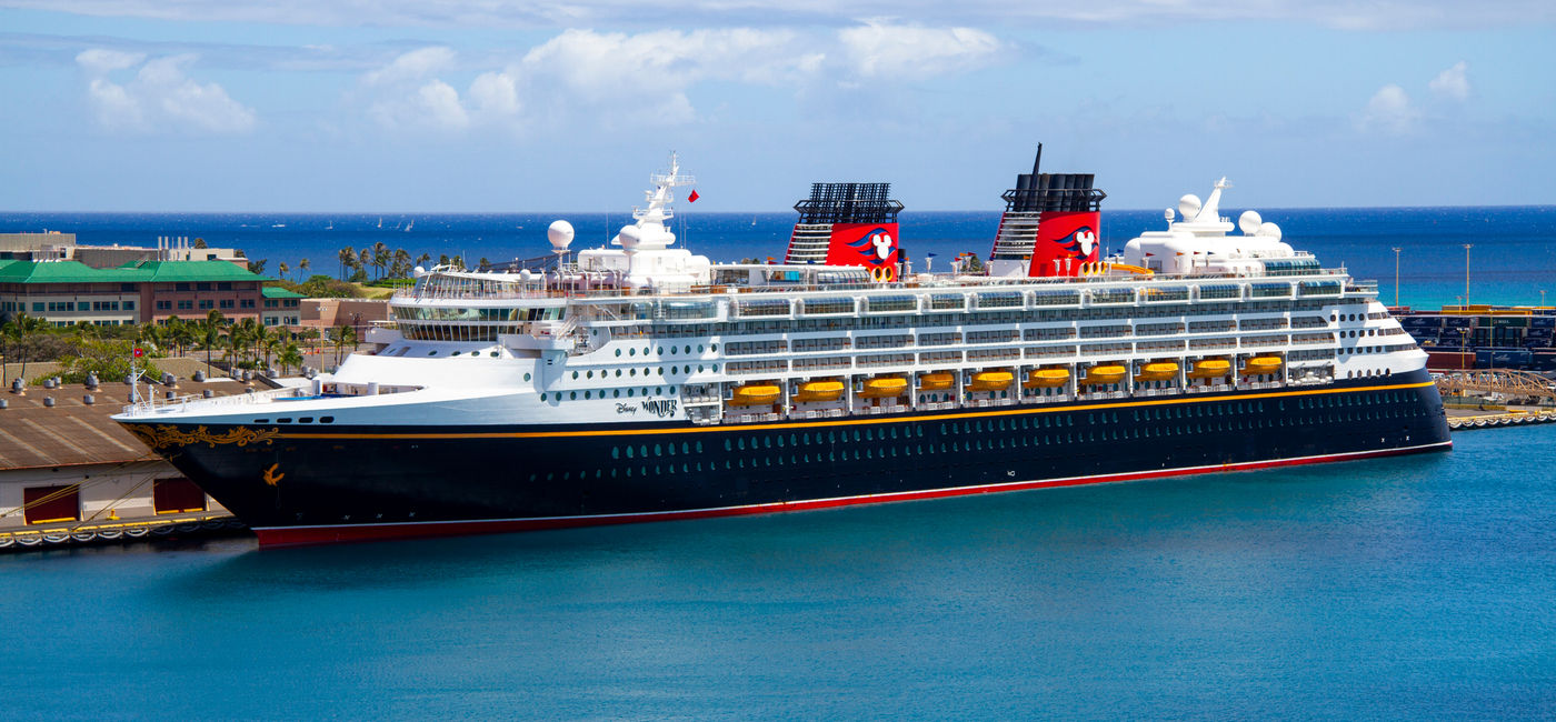 Image: Disney Cruise Line's Disney Wonder docked in Honolulu, Hawaii. (Photo Credit: Adobe Stock/Kyo46)