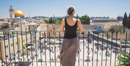 Woman looks on at Jerusalem old city, Israel