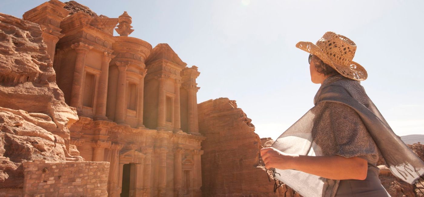 Image: Woman outside of Petra on a Kensington Tour (photo via Kensington Tours) (Photo Credit: (photo via Kensington Tours))