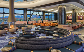 Fireplace and couches in the new Delta Sky Club at Salt Lake City