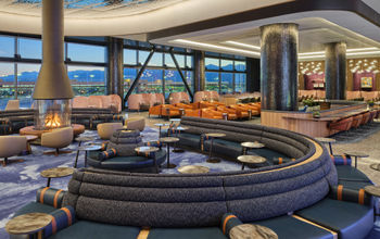 Fireplace and couches in the new Delta Sky Club at Salt Lake City