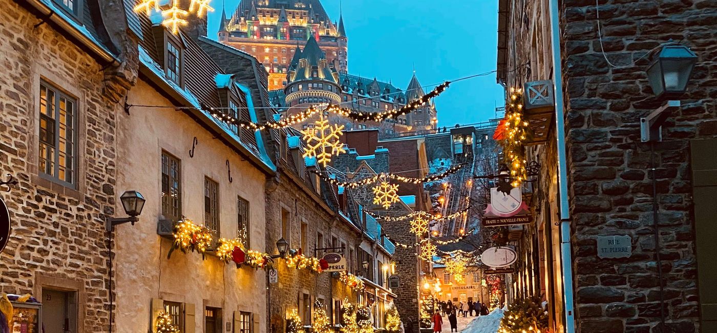Image: The Fairmont Chateau Frontenac smiles down on the historic streets of Old Quebec. (Photo Credit: Debbie Olsen)