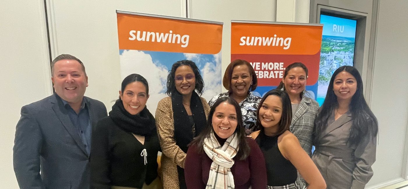 Image: The Riu crew along with Sunwing's Director of Sales Ontario and Atlantic Canada Dave Wright. (Photo Credit: Bruce Parkinson)