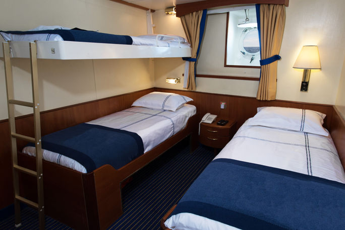 A triple cabin onboard G Adventures' new expedition ship. G Adventures, triple cabin, expedition ship