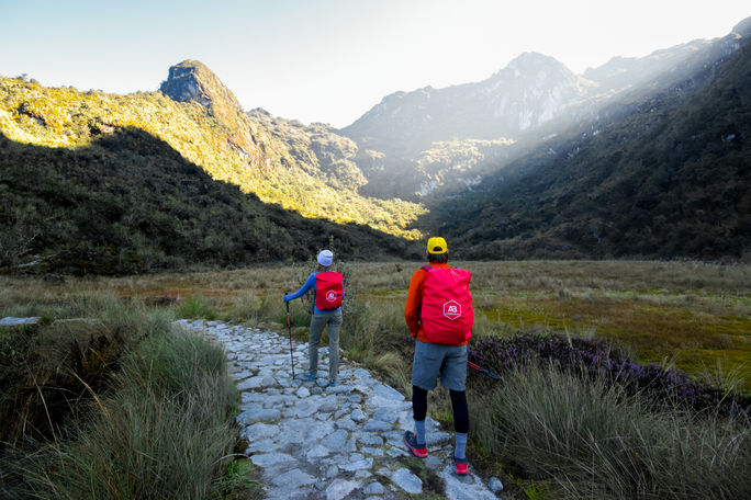 Hikers admire the scenery on the Inca Trail. Hikers admire the scenery on the Inca Trail.