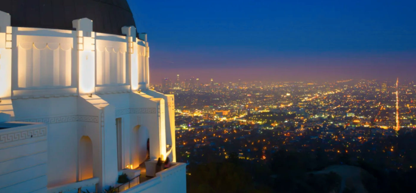 Image: Griffith Observatory overlooking the city lights of Greater Los Angeles. (Photo Credit: Photo via: Discover Los Angeles)