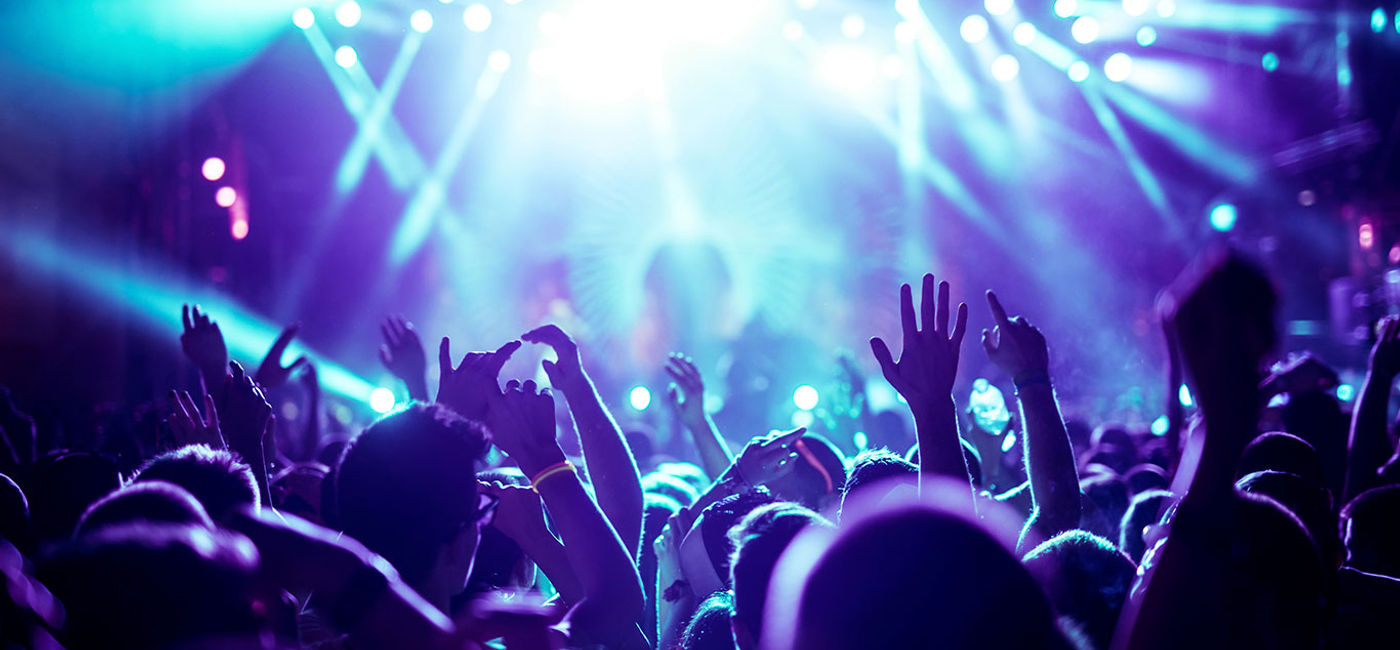 Image: Crowd raising their hands at concert (Photo via bernardbodo / iStock / Getty Images Plus) (Photo Credit: bernardbodo /  iStock / Getty Images Plus)