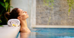 Woman relaxing at a spa.