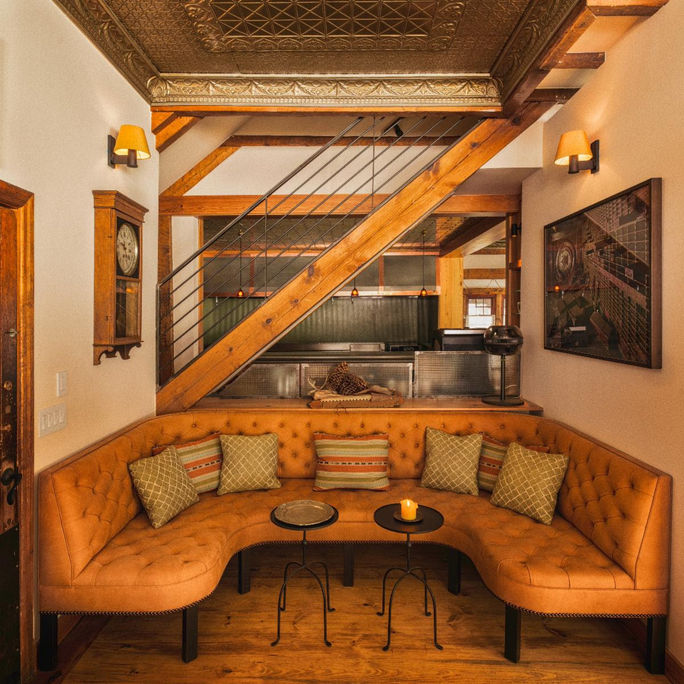 A cozy seating nook in the saloon at Dunton Hot Springs A cozy seating nook in the saloon at Dunton Hot Springs