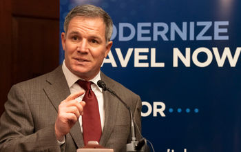 Geoff Freeman, President and CEO of the U.S. Travel Association, speaks to a crowd in Washington, DC