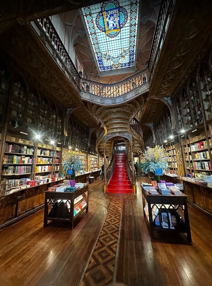 Two stories of gorgeous hardwood fixtures, an elegant central staircase, and beautiful stained glass throughout have earned Porto's Livraria Lello the title of "Most Beautiful Bookstore in the World."