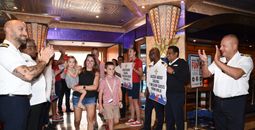 The Litteral family walking onto the Carnival Valor