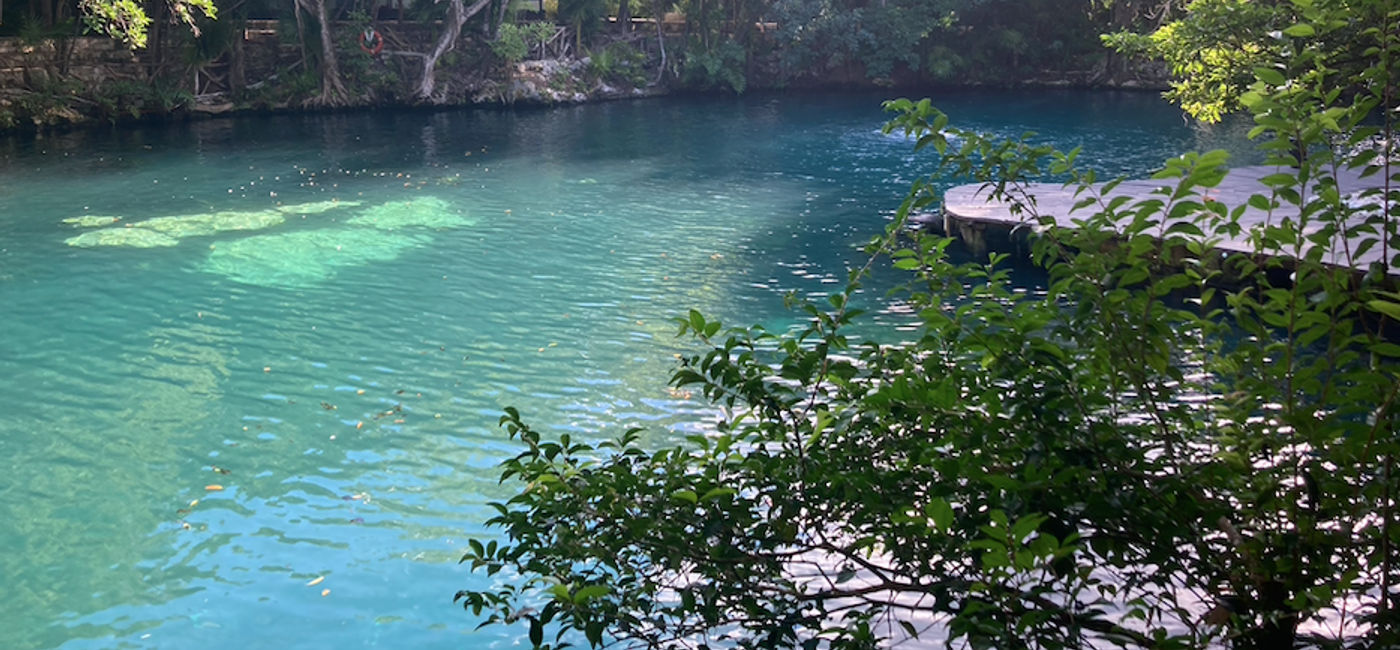 Image: The platform in the cenote off the main lobby provide a magical setting for wedding ceremonies of up to 80 guests. (Photo Credit: Marsha Mowers)