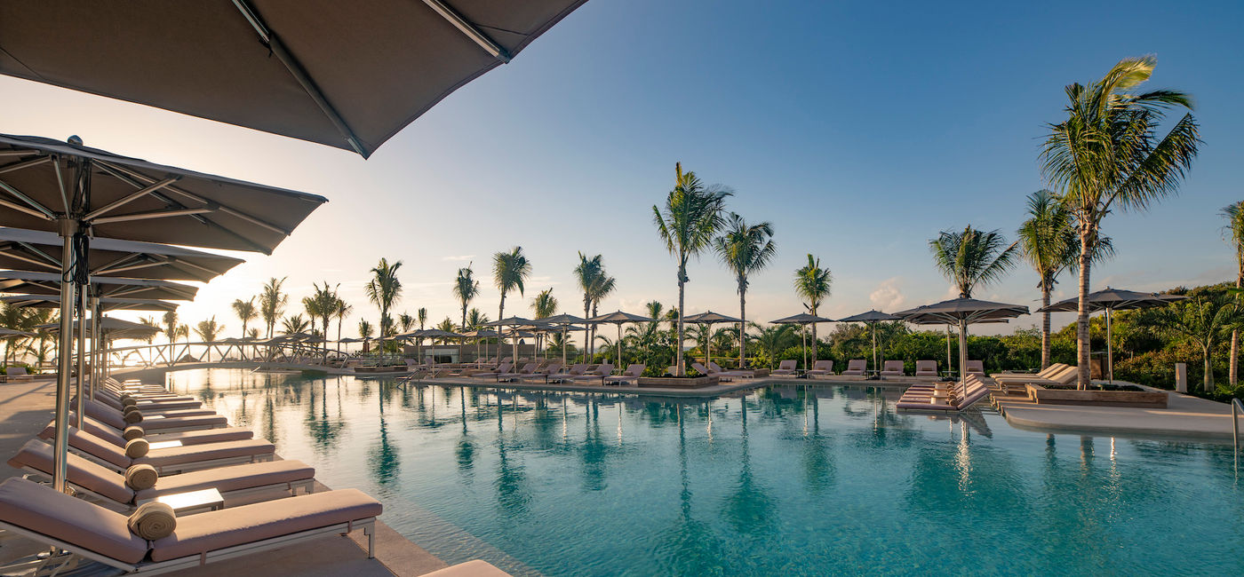 Image: Pool area at ATELIER Playa Mujeres. (photo courtesy of Atelier de Hoteles)